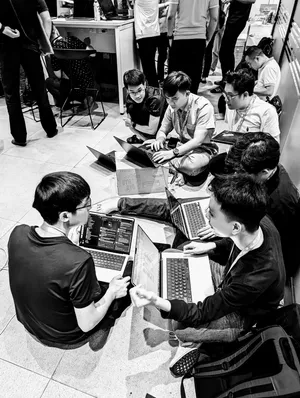 Team hacking on the floor