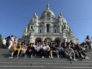 Team on the steps of Sacré-Cœur